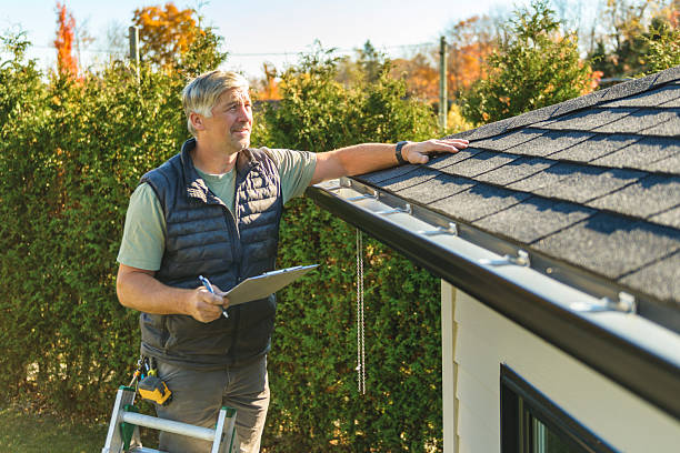 Professional Roofing technician working in Marshall, MO